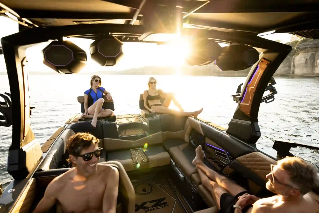 People relaxing on a Tigé boat.